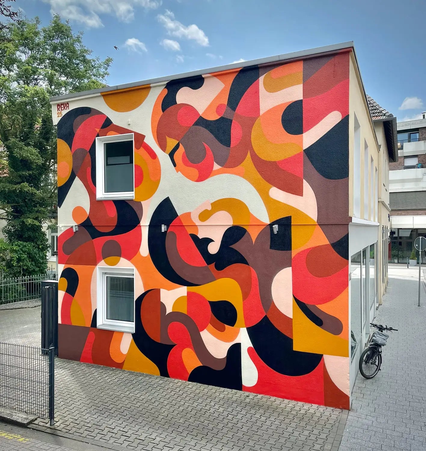 a vibrant abstracted mural by James Reka